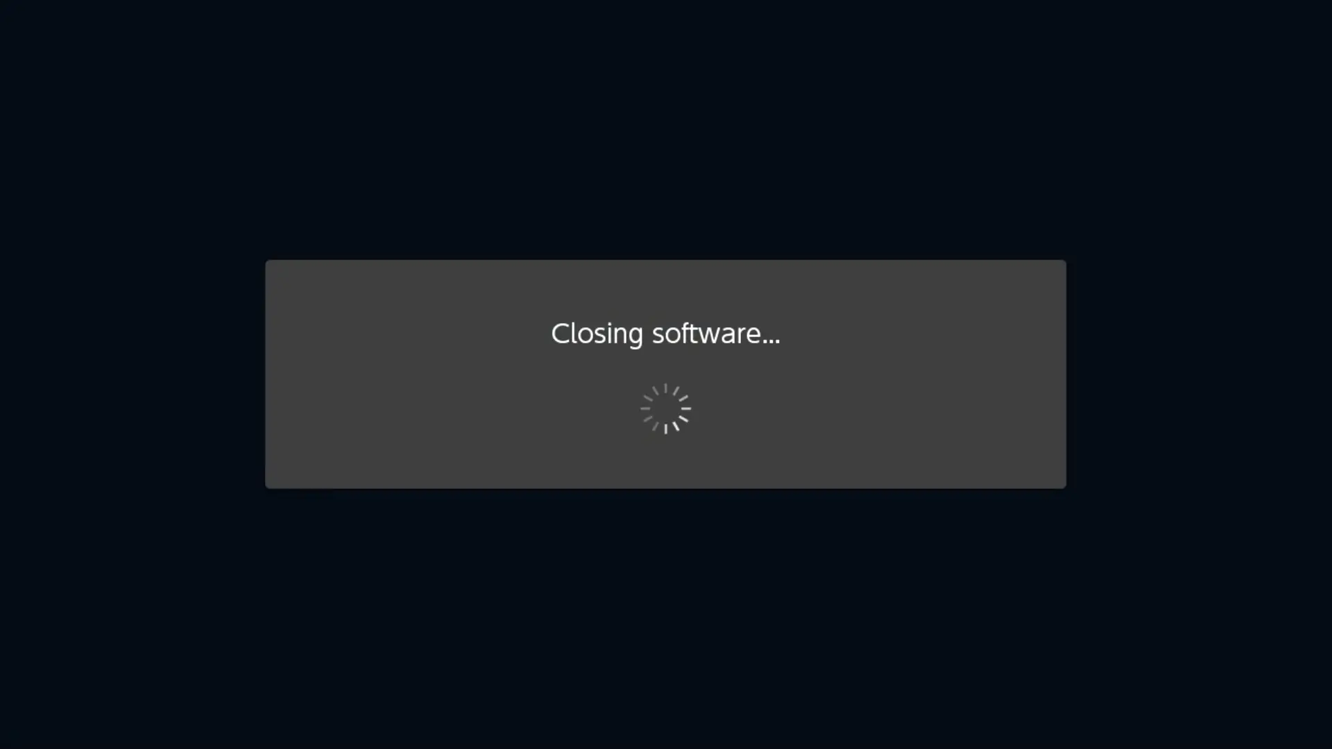 black screen with words closing software and loading button in grey box